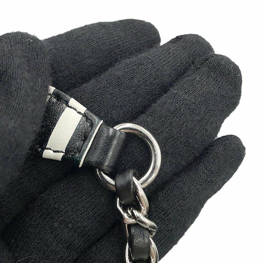 シャネル チェーンショルダーバッグ CCフィリグリー バニティバッグ キャビアスキン A93342 CHANEL 黒 白