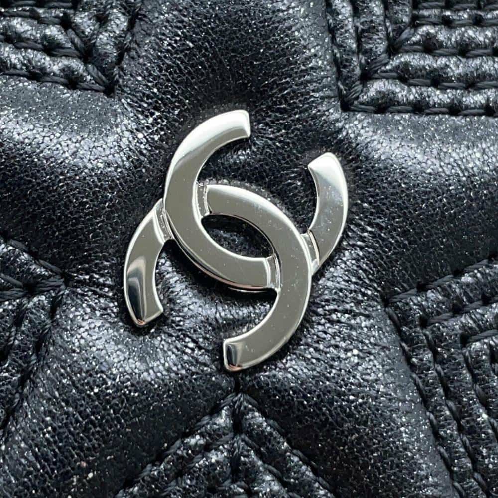シャネル 長財布 スターエンボス ココマーク メタリック レザー A70097 CHANEL 財布 二つ折り長財布 黒