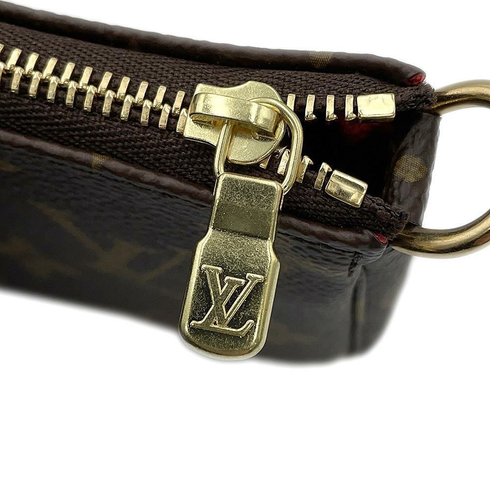 ルイヴィトン ポーチ モノグラム ミニ・ポシェット・アクセソワール M63830 LOUIS VUITTON ライオン