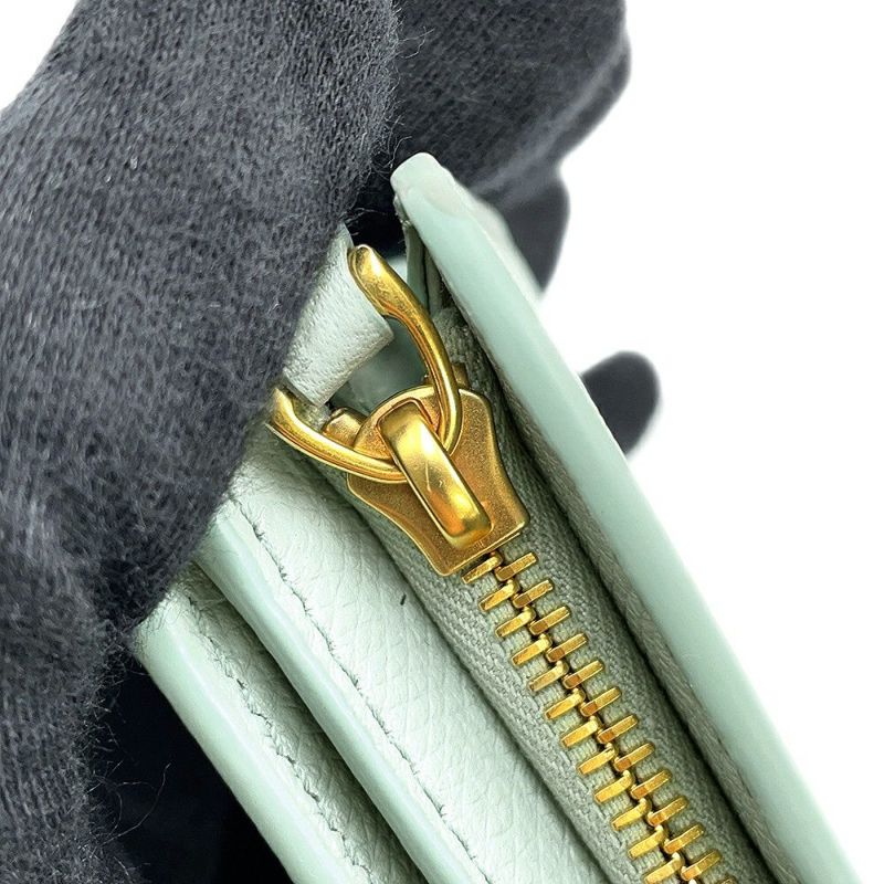 ヴァレンティノ・ガラヴァーニ 二つ折り財布 Vロゴ シグネチャー コンパクト ウォレット 6W2P0AJ5SNP