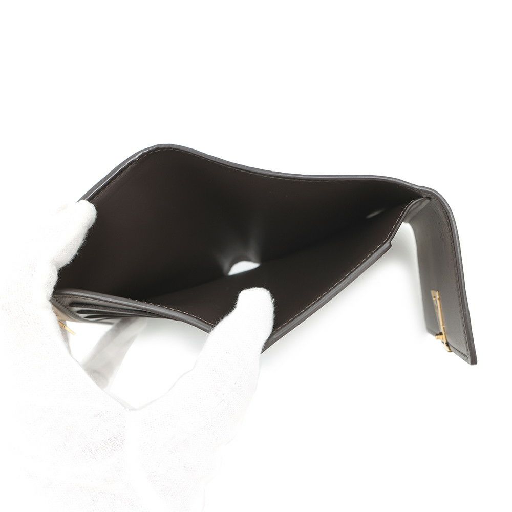 ルイヴィトン 三つ折り財布 トリヨンレザー ポルトフォイユ・カプシーヌ コンパクト M62159