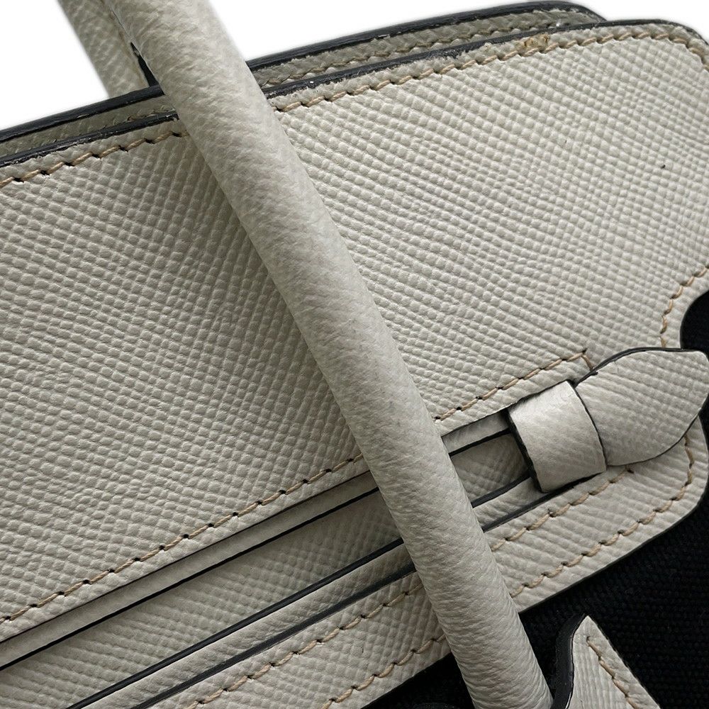 プラダ ハンドバッグ ロゴ サフィアーノ キャンバス BN2595 PRADA 2wayショルダー 黒 白