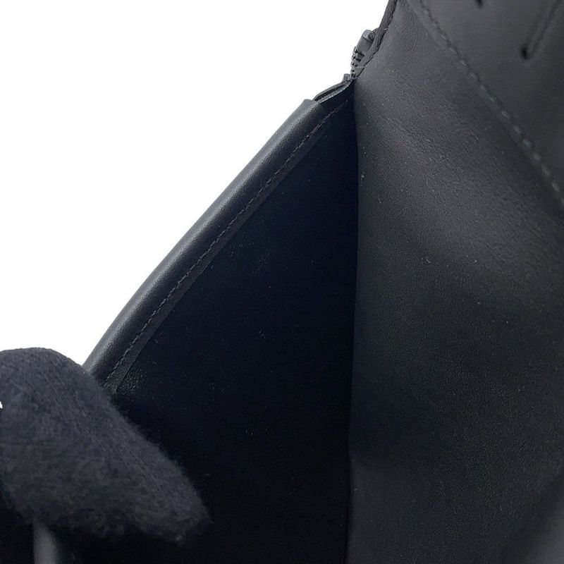 ルイヴィトン 長財布 モノグラム トリヨンレザー ジッピーウォレット・ヴェルティカル M69047 LOUIS VUITTON  財布 メンズ 黒