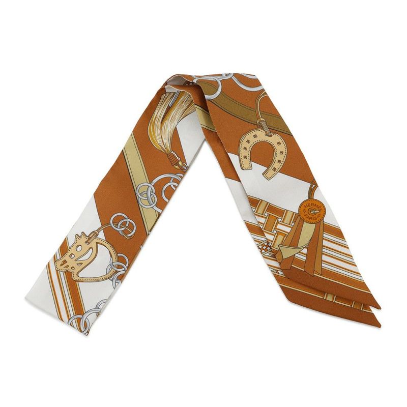 エルメス スカーフ ツイリー 馬勒とチャーム Brides et Gris-Gris HERMES シルクツイル 2023春夏