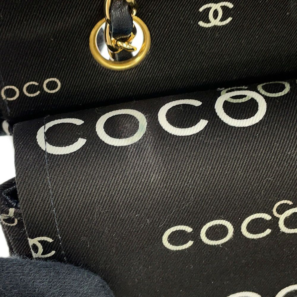 シャネル チェーンショルダーバッグ COCOプリント マトラッセ25 ココマーク ダブルチェーン キャンバス A01112 CHANEL 黒
