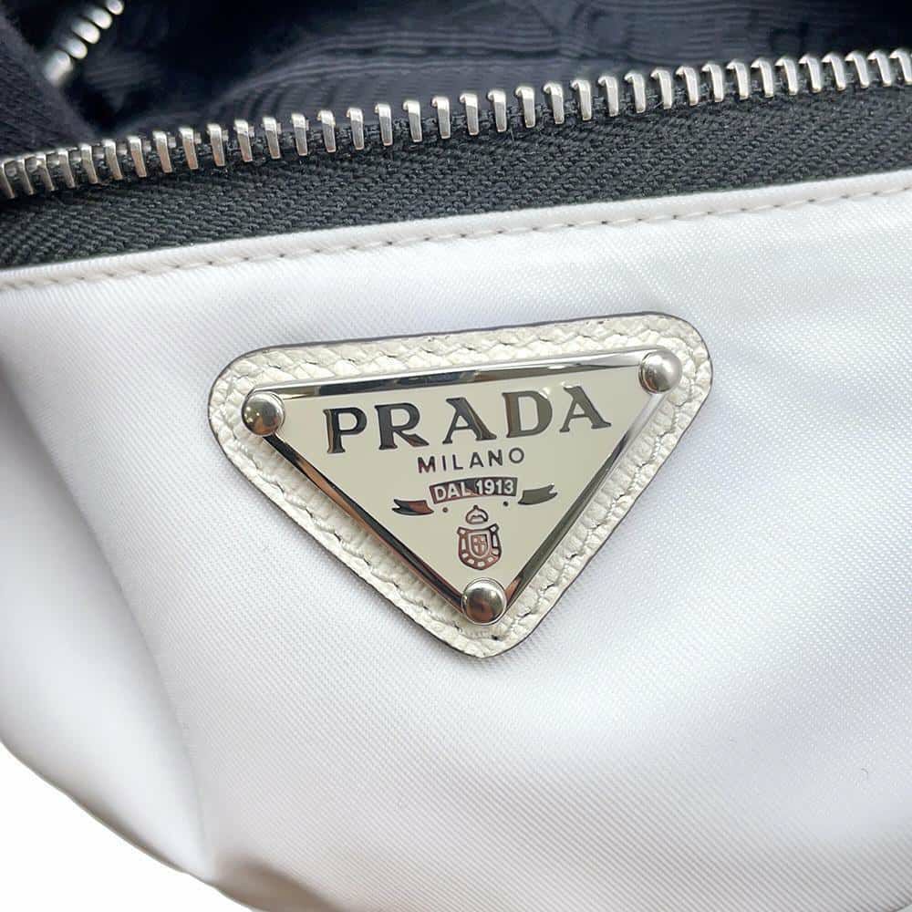 プラダ ポーチ リストバンド ポーチ ロゴ ナイロン 1TT095 PRADA ミニ ポーチ 白 黒